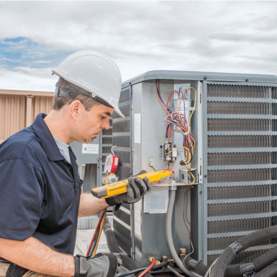 Windsor AC Repair HVAC technician servicing a system